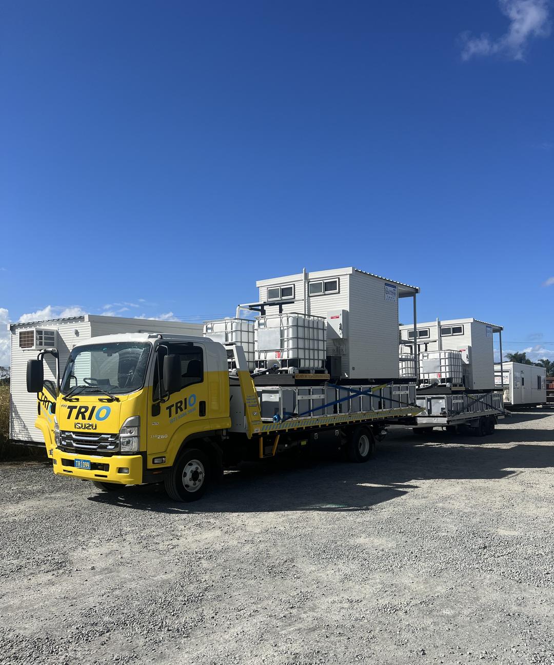 A truck hauling transportable buildings through Central Queensland